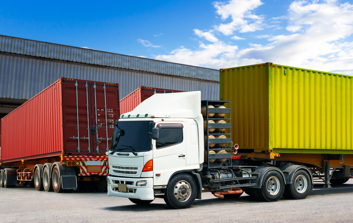 Semi Trailer Trucks on The Parking Lot. Trucks Loading at Dock Warehouse. Shipping Cargo Container Delivery Trucks. Distribution Warehouse, Freight Trucks Cargo Transport, Warehouse Logistic.