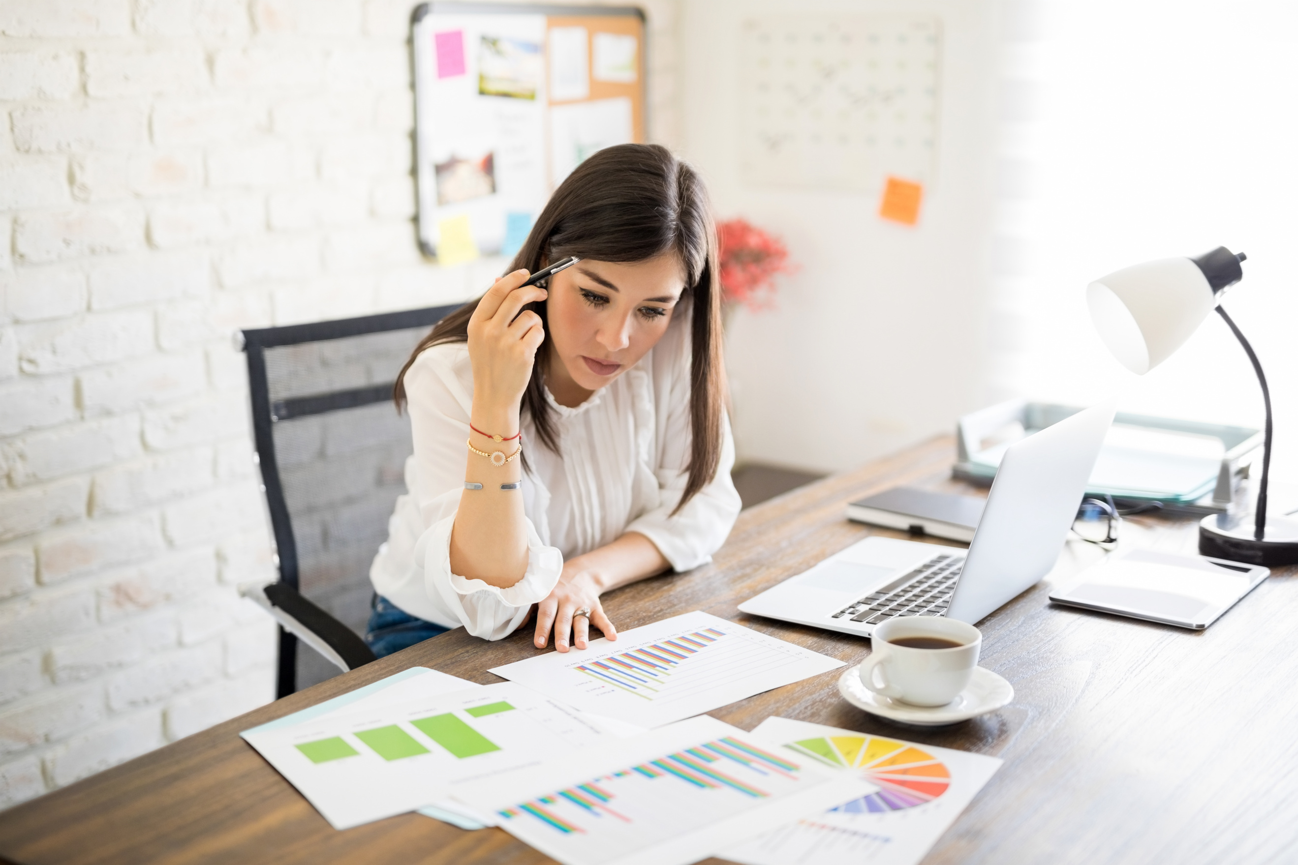 Accounts manager reviewing reports